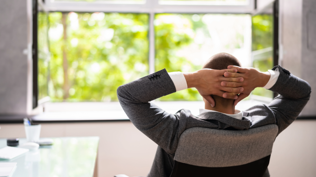 The Role of Ventilation Systems in HVAC Efficiency and Indoor Air Quality 1 a man in a well ventilated office enjoying high quality indoor air 1024x576 1