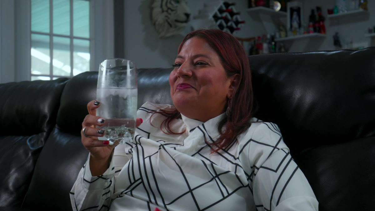 Air Conditioner Maintenance and Service 5 Customer reclining with a sense of relief after scheduling air conditioning maintenance